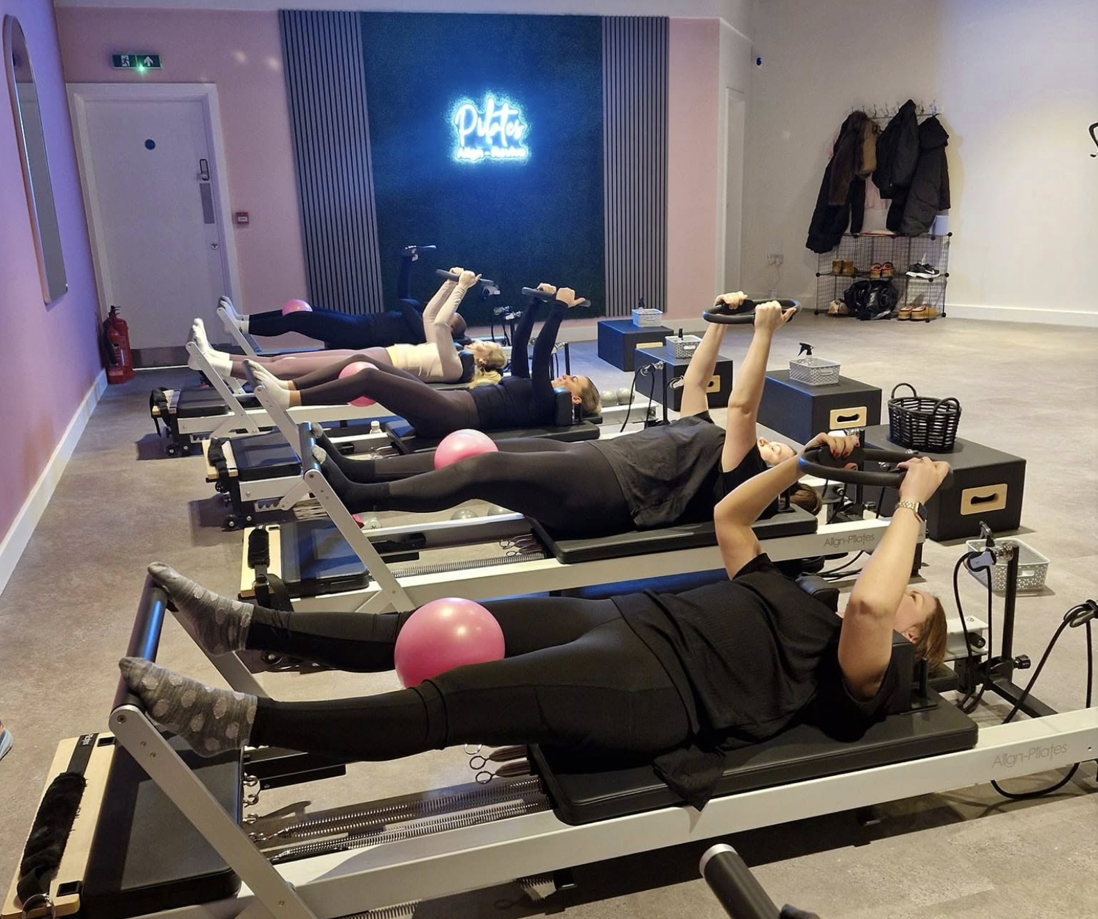 Reformer Pilates being done in Align and Revive studio Newark